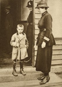 East End child with a policewoman by English Photographer